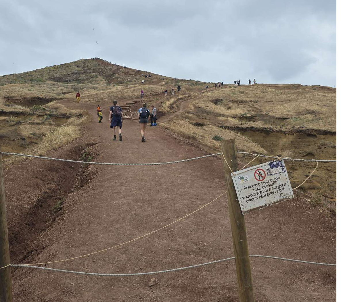 Tourists Jump Fence to Access Closed Trail
